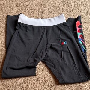 Nike Black Leggings with White Waistband and Multicolor Logo
